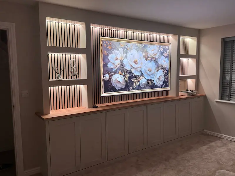 Media wall entertainment center with backlighting