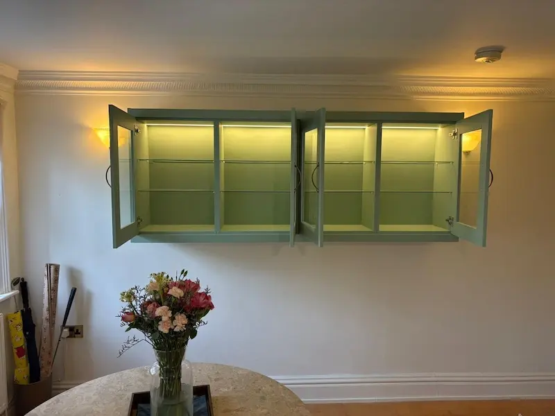 Floating display cabinets with subtle internal strip lighting