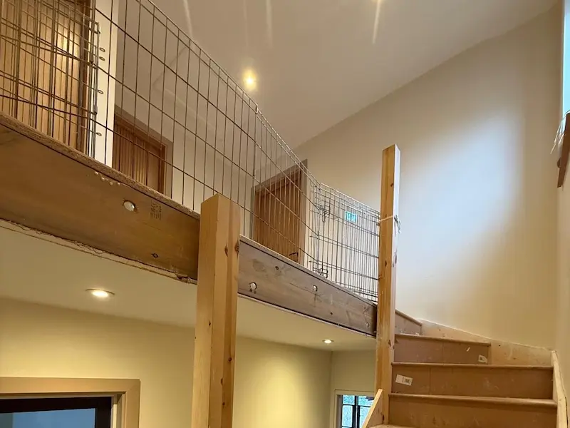 Temporary guarding installed on exposed hallway landing