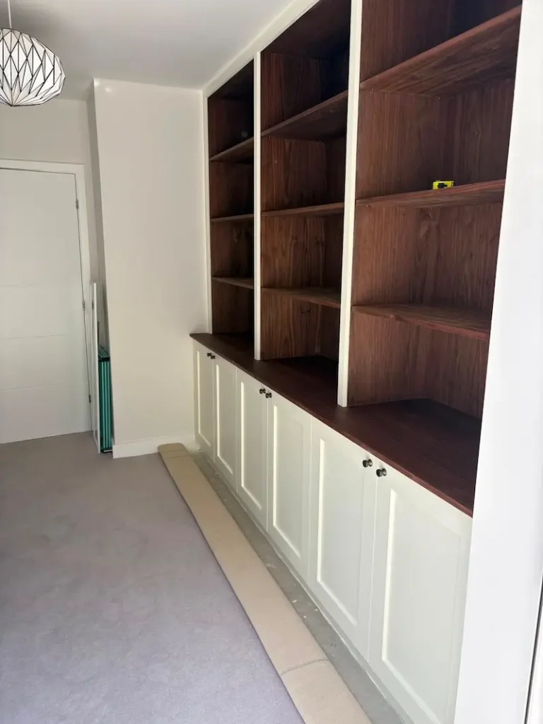 Bespoke cabinetry and fitted walnut shelving in Tonbridge