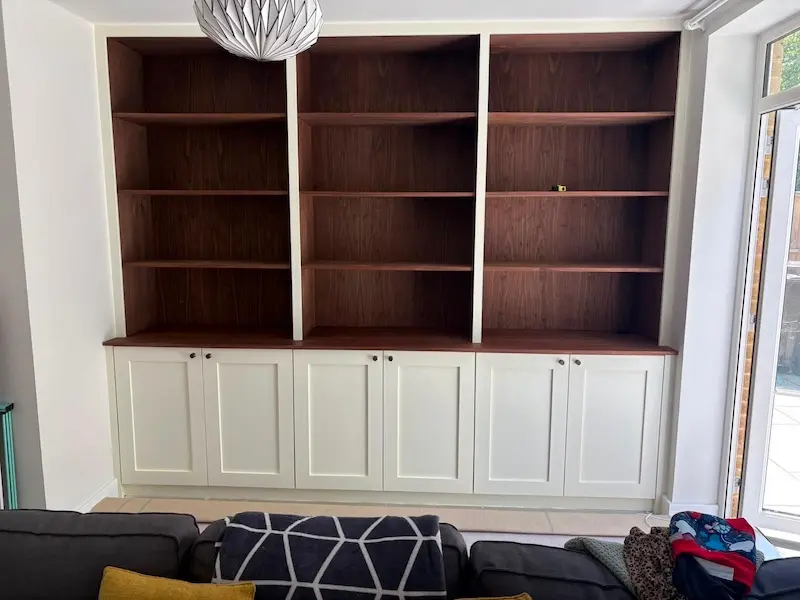 Walnut shelving and cabinetry in Tonbirdge